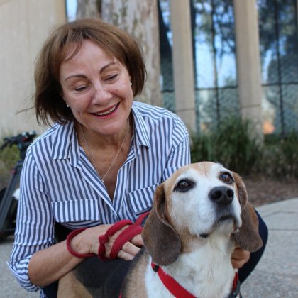 Owner Brenda Douglas with Hoover, the world’s first patient to receive the novel nanomedicine Owner-Brenda-Douglas-pats-her-beagle-Hoover